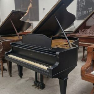 Piano Story Clark - vista lateral