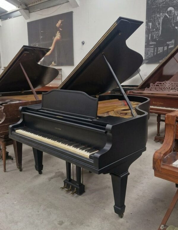 Piano Story Clark - vista lateral